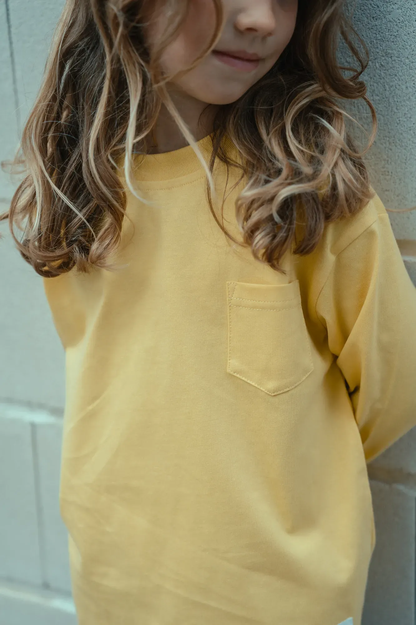 Camiseta Lisa Bolsillo Amarilla
